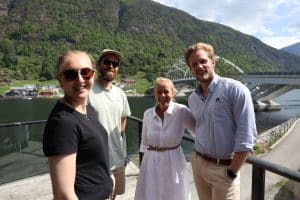 employees at rocketfarm outside rockethouse on a sunny day